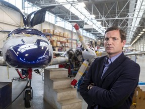 Diamon Aircraft CEO Scott McFadzean stands next to a flagship DA62 under construction at their Crumlin Sideroad facility on Thursday, April 29, 2021. The twin engine DA62 sells for about $2 million and will be subject to a new luxury tax introduced in the latest federal budget. The carbon fibre DA62 can be built to carry five or seven people and can cruise at 20,000 feet for up to 1,000 nautical miles.  (Mike Hensen/The London Free Press)