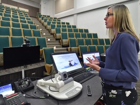 University of Alberta chair of occupational therapy Mary Forhan makes an online presentation to occupational therapists in an empty lecture hall in Edmonton in May. (Postmedia file photo)