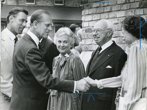 Prince Philip is introduced to guests by Col. Phillip Spencer, left, a military base commander in London, in 1983. Centre is Beryl Ivey, J. Allyn Taylor and Lorraine Shuttleworth. (London Free Press files, June 30, 1983)