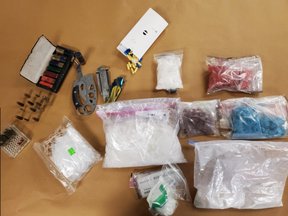 London police seized two loaded guns and $300,000 worth of drugs, including methamphetamine, from a home on Gatwood Road April 15. (London police handout)