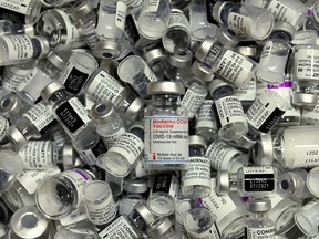 Moderna, Pfizer-BioNTech and AstraZeneca COVID-19 vaccine vials are seen at a vaccination centre in Rosenheim, Germany.