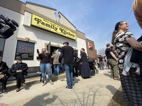 Supporters of Family Kitchen restaurant, which is remaining open in defiance of a provincial lockdown order, gathered Tuesday, April, 6, 2021, to protest Ontario's COVID-19 restrictions.