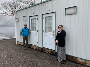 Sanctuary London's Gil Clelland, left, and Sarah Campbell, co-ordinator of the Winter Interim Solution to Homelessness (WISH), see plenty of potential in refurbishing donated staff trailers from Woodbine Racetrack into larger housing units for London's homeless, complete with air-conditioning, heating and plumbing. (Randy Richmond/The London Free Press)