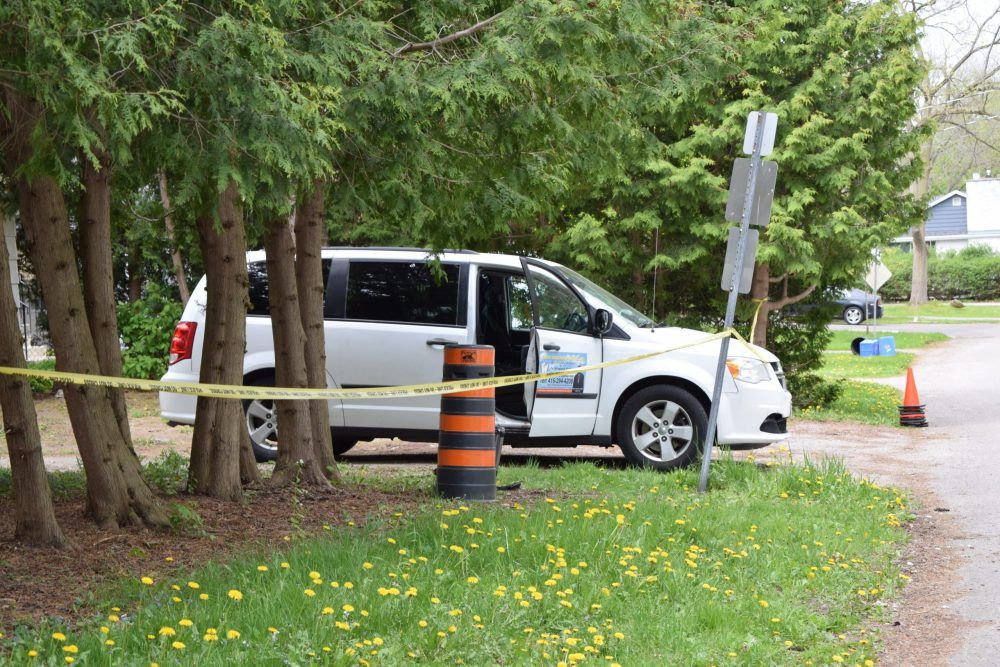 Yellow police tape is shown around a residential property near King's University College in London, where police are investigating a fatal stabbing. Photo taken Sunday May 16, 2021. (Calvi Leon/The London Free Press)