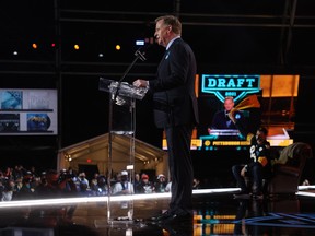 NFL Commissioner Roger Goodell announces a team's selection at the league's 2021 draft in Cleveland last week. (Getty Images)