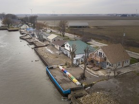 Battered waterfront homes on Erie Shore Drive, south of Blenheim, are pictured Thursday, Nov. 28, 2019.