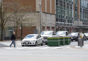 The westbound lane of Dundas Street is blocked at Wellington Street. The eastbound lane is similarly blocked at Ridout Street. (Derek Ruttan/The London Free Press)