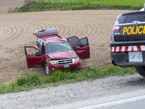 One person was taken to hospital after a vehicle left Elgin Road and rolled over into a farm field south of Gore Road  near Dorchester, Ont. on Thursday May 6, 2021. Derek Ruttan/The London Free Press