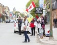 Fifteen people protest COVID-19 lockdown restrictions outside of the post office  in Glencoe on Friday, May 7, 2021. Derek Ruttan/The London Free Press