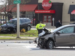 Two people were rushed to hospital following a two vehicle collision on Wonderland Road south of Southdale Road in London, Ont. on Friday May 7, 2021. (Derek Ruttan/The London Free Press)