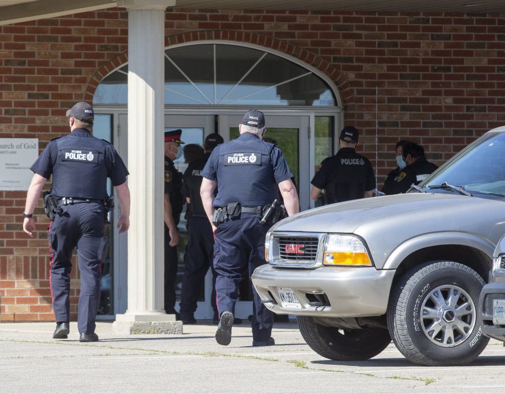 Locks changed on doors of Church of God as congregation sings hymns