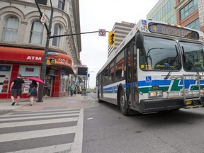 A London Transit Commission bus drives through the intersection of Richmond and Dundas streets in downtown London. (File photo)