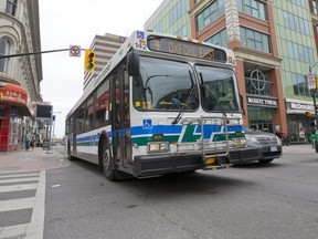 A London Transit Commission bus drives through the intersection of Richmond and Dundas streets in downtown London. (File photo)