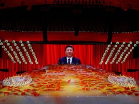 A giant screen shows Chinese President Xi Jinping during a show commemorating the 100th anniversary of the founding of the Communist Party of China at the National Stadium in Beijing on Monday. The victors write history, Gwynne 
Dyer notes, but he doubts the Communist Party really has much to brag about. (Thomas Peter/Reuters)