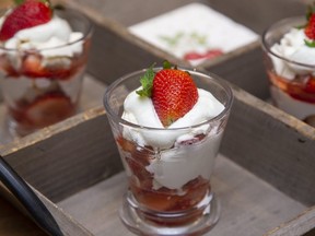 Combine fresh local strawberries with stewed rhubarb, crumbled meringue and whipped cream for a quick, easy seasonal dessert, food columnist Jill Wilcox says. (Derek Ruttan/The London Free Press)