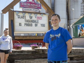 Grace Jones, left, helped organize a celebration of Thorndale's graduating students including Beth McCallum, who is graduating from West Nissouri elementary school. (Derek Ruttan/The London Free Press)