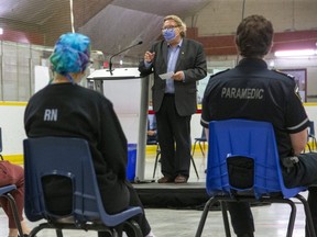 London Mayor Ed Holder thanks staff at the COVID-19 assessment centre at Oakridge arena on June 30, 2021. The centre has closed because fewer people require tests. (Derek Ruttan/The London Free Press)