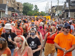 Thousands of people march north on Richmond Street toward Oxford Street during the Turtle Island healing walk in London, Ont. on Thursday, July 1, 2021. A letterwriter objects to the walk being lumped in with a protest in Sarnia. (Derek Ruttan/The London Free Press)