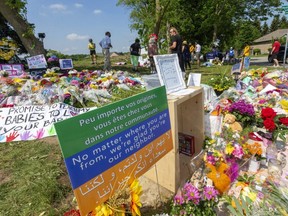 Signs proclaiming solidarity went up across London and at the memorial site at Hyde Park and South Carriage roads, where four members  of a Muslim family died after being hit by a pickup June 6 in what police say was a targeted, hate-motivated attack. (Mike Hensen/The London Free Press)