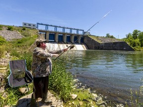 Josh Gowing, of Stratford, is a keen angler who fishes once or twice times a week. Gowing was fishing for big carp just below the Fanshawe Dam on Tuesday, June 15, 2021. Gowing says people look down on carp fishing which is a shame because they can fight nearly as hard as some game fish like salmon or rainbow trout. Gowing says he throws all his fish back to fight another day, "I just love the fishing. It's exciting every single time." One thing Gowing hates is the litter left behind by anglers. "It's terrible; I wish I brought a big garbage bag. This is ridiculous" he said of the fishing line, coffee cups and water bottles strewn on the banks. (Mike Hensen/The London Free Press)