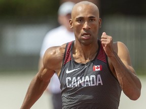 Canadian decathlete Damian Warner practices his starts at Medway HS in Arva north of London, Ont. on Monday June 21, 2021. (Mike Hensen/The London Free Press)