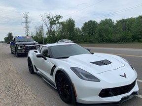 This white Corvette was impounded after London police said a vehicle was clocked going nearly double the 60 km/h speed limit on Wonderland Road. (London police photo)