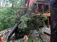 High winds and a possible tornado caused trees to snap in half and ripped off parts of homes in Walter's Falls Saturday night shortly after Environment Canada issued a tornado warning for the area, near Owen Sound. Greg Cowan/The Sun Times