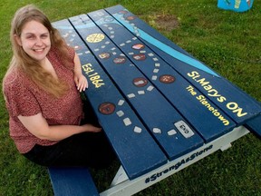 Laura McAsh thought a St. Marys-themed board game would make a good addition to this picnic table at Milt Dunnell Field. McAsh is one of 10 local artists who took part in a town-wide project to add some colour to public picnic tables in St. Marys earlier this year. Chris Montanini\Stratford Beacon Herald