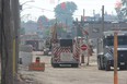 London Firefighters responded Tuesday morning to Swinyard Street in east London after a gas line was pierced by a construction crew. About 20 people were displaced from area homes and businesses. (JONATHAN JUHA/The London Free Press)