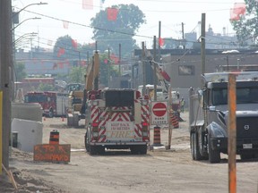 London Firefighters responded Tuesday morning to Swinyard Street in east London after a gas line was pierced by a construction crew. About 20 people were displaced from area homes and businesses. (JONATHAN JUHA/The London Free Press)