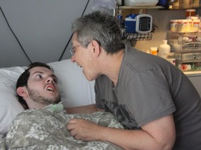 Abby Roby talks to her son, Tristan, following a day of treatment for the 19-year-old who was seriously injured in a hit-and-run exactly two years ago. Photo taken on Wednesday July 21, 2021. JONATHAN JUHA/The London Free Press