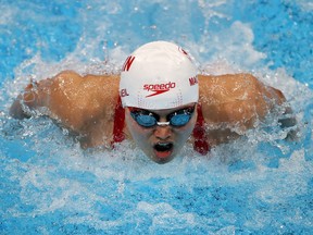 Maggie McNeill of London competes in the women's 4x100m medley final at the Tokyo 2020 Olympic Games on August 01, 2021 in Tokyo, Japan.  She helped Canada win bronze, her third medal of the Games.  (Photo: Francois Nel/Getty Images)