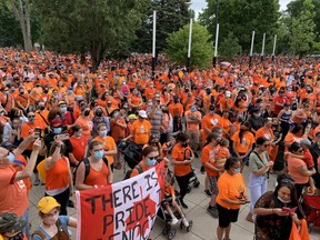 An estimated crowd of 10,000 gathered for a Canada Day march in downtown London to mourn the Indigenous victims of Canada's residential school system. (DEREK RUTTAN, The London Free Press)