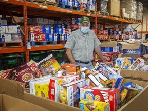 Glen Pearson, co-executive director of the London Food Bank, said a decline in government aid could be one reason why more families are using the food bank as the pandemic eases. “I just think there’s a lot going on out there that we just don’t understand, but it’s not a good picture,” he said (Derek Ruttan/The London Free Press)