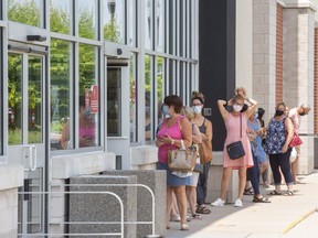 Shoppers wait their turn to enter HomeSense on Wonderland Road in London, Ont. on Tuesday June 29, 2021. (Derek Ruttan/The London Free Press)