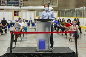 Dr. Chris Mackie thanks staff at the Oakridge arena COVID-19 assessment centre during a news conference Wednesday, June 30, 2021 to announce the site's last day of operation will be on July 16. (Derek Ruttan/The London Free Press)