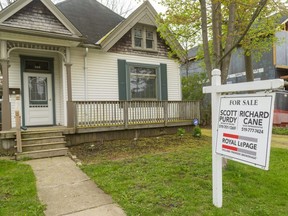 Multiple offers and over-asking selling prices are getting less frequent as London's real estate market cools slightly.  June, however, still was a record setting month with 1,194 sales in the London and St. Thomas Association of Realtors' jurisdiction. (Mike Hensen/The London Free Press)