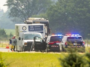 A section of Highway 401 east of Chatham was closed July 7, 2021, while the province's Special Investigations Unit gathered evidence at the scene where a man was shot by an OPP officer. The man, whose identity has not been released, died later in hospital. The province's Special Investigations Unit said Friday Chatham-Kent OPP Const. Sean O’Rourke is charged with manslaughter and criminal negligence causing death in the man's death. (Mike Hensen/The London Free Press)