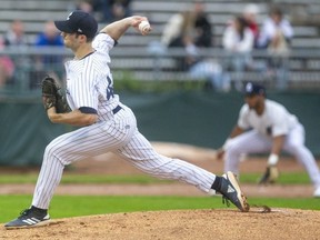 Owen Boon pitches for the London Majors. Photograph taken on Friday July 9, 2021. (Mike Hensen/The London Free Press)