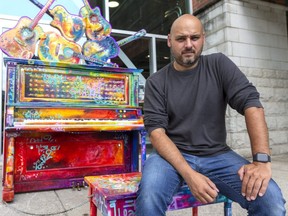 Edward Platero is co-creator of the 88 Keys of Light art piece, a player piano art installation outside the Covent Garden Market in downtown London. Platero, has had to modify the installation after it was repeatedly vandalized in its first few days on display here. Photo taken Wednesday July 14, 2021. (Mike Hensen/The London Free Press)