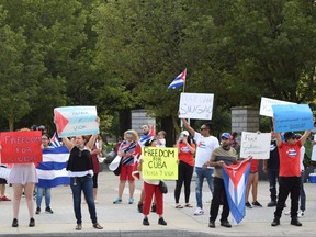About 50 people marched in downtown London to express support for citizens in Cuba who are protesting that country's government. Photo taken on Wednesday July 14, 2021.