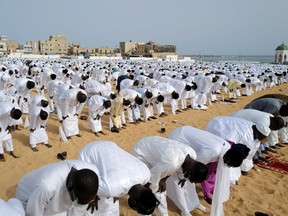 Senegalese Muslims from the Layene Brotherhood, a religious sect of Sufi Muslims, attend Eid-al-Adha prayers, in Dakar, Senegal July 21, 2021. REUTERS/Zohra Bensemra