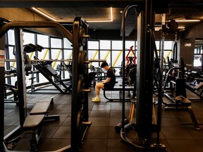 A gym member practices in a fitness club amid the COVID-19 pandemic in Seoul, South Korea, July 12, 2021. Gyms and other fitness centres are ready to open again in Ontario this Friday. (REUTERS/Heo Ran)