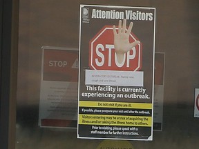 A COVID-19 sign is posted at a long-term care home in Ontario. (Postmedia Network file photo)