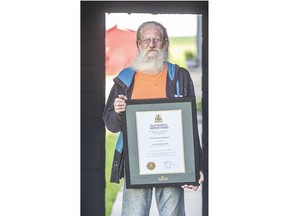 John Sherratt, 73, recently earned a bachelor's degree from Western University's King's University College, 50 years after he first started. (Derek Ruttan/The London Free Press)