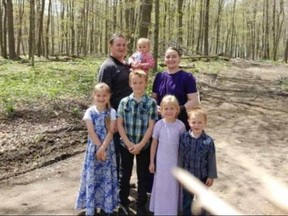 Jake and Tina Hiebert are pictured with their five children. The parents and three of the kids were badly hurt in a firepit mishap at a relative's home in Port Burwell. Layla, age one, later died of her injuries. (Submitted)