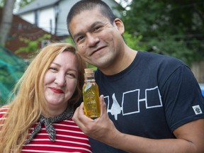 Gillian Leitch and Verlin James, partners in a beekeeping, honey-making, wax- making business, AlterEden, will be among the artisans involved in a pop-up market July 10 at 8 Elworthy Ave. in London's Old South neighbourhood. It runs from 10 a.m. to 4 p.m. (DEREK RUTTAN/The London Free Press)