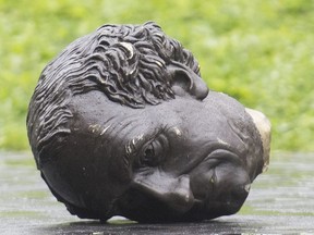 The head of a statue of Sir John A. Macdonald is shown torn down following a demonstration in Montreal, Saturday, Aug. 29, 2020.