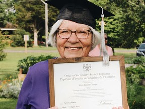 Louise George, 72, of Kettle and Stony Point First Nation, holds her high school diploma. George decided after she retired to finish high school through the adult and continuing education program at the Lambton-Kent District School Board.