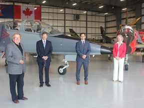 London Mayor Ed Holder, left, London International Airport chief executive Mike Seabrook, MP Peter Fragiskatos and MP Kate Young take part in a news conference Tuesday, Aug. 4, 2021, at the International Test Pilots School near the airport at which officials announced the airport will receive $4.5 million in funding from the federal government to help it rebuild after COVID-19. (MEGAN STACEY/The London Free Press)